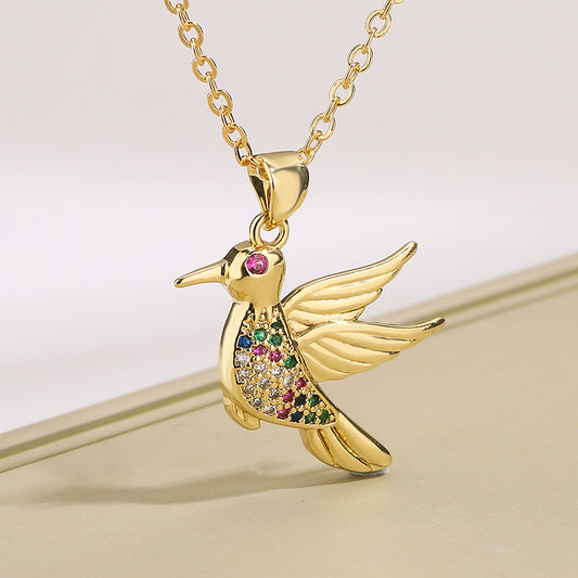Niche Bird Pendant: Copper & 18K Gold Elegance.