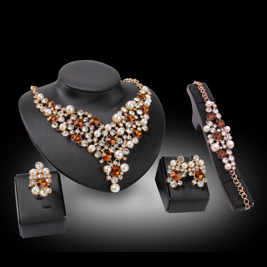 Elegant Four-Piece Bridal Jewelry Set: Necklace and Earrings.