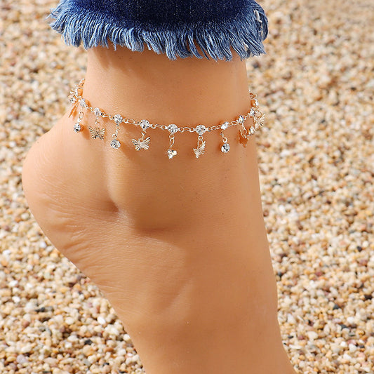 Bohemian Bliss: Butterfly Tassel Anklet and Colorful Oil Necklace with Flowers and Leaves.